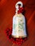 Porcelain bell with red Christmas berries