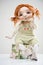 Porcelain clay young smiling redhead girl