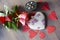 Porcelain heart on the wood table with flower and paper heart