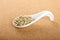 Porcelain spoon with seeds lentils