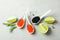 Porcelain spoons with caviar, lime slices and spices