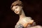 Porcelain statue of a lady in a ball gown