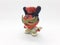 Porcellain Statue Of Masked Mouse Holding Magical Wand In White Isolation Back Ground 01