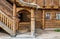 Porch at the entrance to the log house. Russian architecture