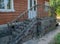 The porch of the old house with decorative railings