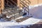 The porch of a private house is cleared of snow