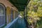 Porch of wooden house in spanish colonial style with a porch. Wooden district of Key West, Florida.