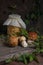 Porcini mushroom commonly known as Boletus Edulis and glass jar with canned mushrooms on vintage wooden background