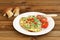 Porcini mushrooms omelette with tomatoes and scallion with two w