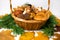 Porcino, honey mushrooms, imleria badia mushrooms in basket on a white background