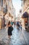 POREC, CROATIA - 19 May, 2019: woman walking by small porec streets in croatia