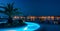 Porec, Croatia at night, illuminated pool in front