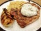 Pork Chop with tzatziki sauce and couscous