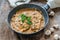 Pork chops in creamy cajun sauce with button mushrooms and egg noodles