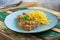 Pork chops in creamy cajun sauce with button mushrooms and egg noodles