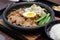 Pork with egg and vegetables teppanyaki