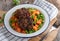 Pork meatballs with buttered peas and carrots