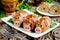 Pork meatballs stuffed with minced meat and rice in crispy chicken skin shaped funny pigs