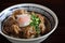 pork rice bowl with egg on wood backround japanese local food butadon