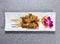 Pork satay sticks served in dish isolated on grey background top view of hong kong food