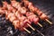 Pork skewers on a grill