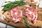 Porky steak with spice and herb on wood background