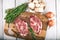 Porky steak with spice and herb on wood background