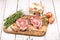 Porky steak with spice and herb on wood background