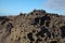 Porous lava volcanic rock around around Playa de la Concha beach