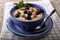 Porridge made with traditional irish oatmeal in a blue bowl