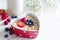 Porridge oatmeal with fruits in heart valentines food love concept