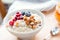 Porridge oats with almonds and berries, close up