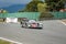 Porsche 962 Alpha team Group C racer in a classic car race at the Jarama circuit