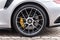 Porsche car fragment, rear wheel on Pirelli tire