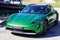 Porsche taycan 4s Sport Turismo ev car sporty luxury vehicle in side view street