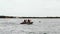 PORT ARANSAS, TX - 24 FEB 2020: Three fisherman in a fishing boat.