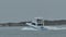 Port Aransas, TX - 6 Feb 2018: Fishing boat heading toward land though the channel from the Gulf of Mexico.