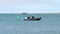 PORT ARANSAS, TX - 7 FEB 2020: Small rubber raft boat with outboard motor.