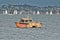 Port of Auckland pilot boat idle in the water watching yachts racing