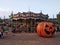 Port Aventura carousel decorated for the Halloween party with a giant pumpkin.