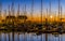 The port of Blankenberge at sunset, many docked boats, beautiful city scenery of a popular town in Belgium