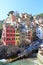 Port of Cinque Terre village Riomaggiore with colorful houses