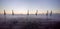 Port cranes shrouded in the morning mist