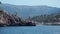 Port de Soller, Mallorca, Spain. The lighthouse and the rocks around the village from the boat