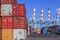 Port dock with container ship and Various brands and colors of shipping containers stacked in a holding platform