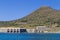 Port of Favignana and Forte Santa Caterina castle on top of mountain, Sicily,