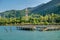 Port ferry boat with concrete pier.