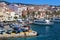 Port of La Maddalena in Italy. Boats, tourists and cars.