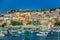 Port of La Maddalena in Italy. Boats, tourists and cars.