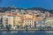 Port of La Maddalena in Italy. Cars on the seafront